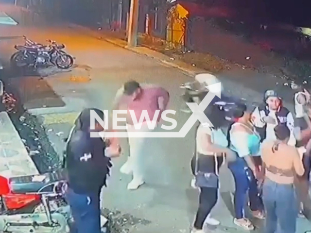 Hansel Santos accidentally shots his friend  Yensy Rosa in the head outside a bar in Las Palomas, Dominican Republic, on Sunday, Aug. 7. The man  died as a result of his injuries . Note: This picture is a screenshot from the video (Newsflash).