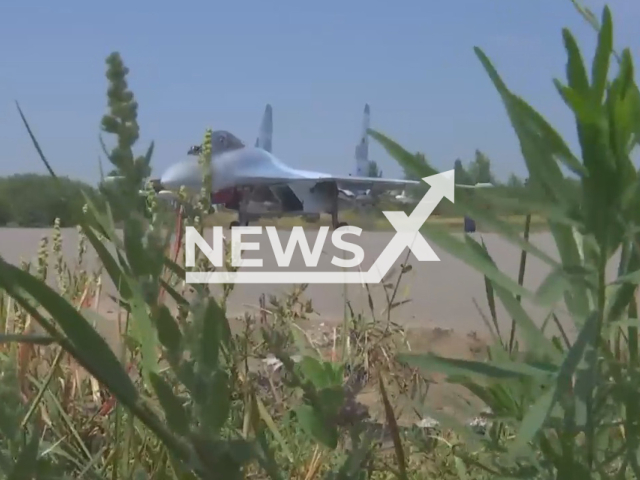 Russian Su-35S fighter takes off to combat mission in Ukraine in undated footage.
The Sukhoi Su-35 is the designation for two improved derivatives of the Su-27 air-defence fighter.
Note: Picture is a screenshot from a video (Ministry of Defense of Russia/Newsflash)