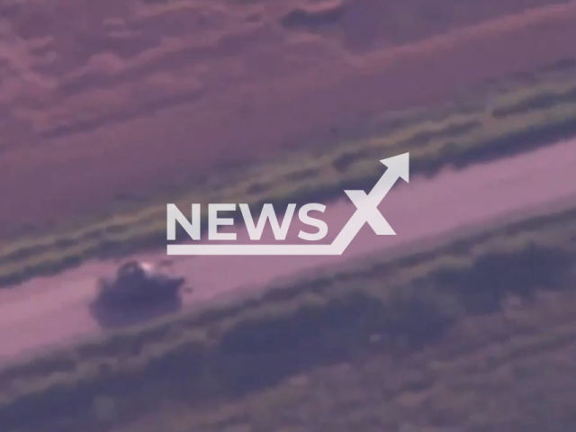 Russian tank drives on an open road before it was destroyed by the fighters from the 40th artillery brigade in Ukraine in undated footage.
Ukrainian authorities repot that the tank was destroyed by a M777 howitzer Note: Picture is a screenshot from a video (@40OAbrigade/Newsflash)