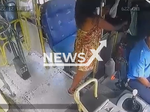 Unidentified woman stealing from driver's backpack on bus in Greater Sao Luis, Brazil, on July 19, 2022. The bus company is collaborating with police who are looking for the woman. Note: Picture is a screenshot from a video (Newsflash)