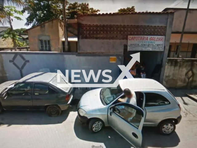 A photo from Google Maps Streetview of fugative Fabiano Sousa da Conceicao  getting in a car at the address police suspected he was located at, in Rio de Janeiro, Brazil, undated.  Police have been looking for him for 18 years   for robbery and concealment of a corpse. Note: Photo is a screenshot from a Google Maps. (Google Maps/Newsflash)