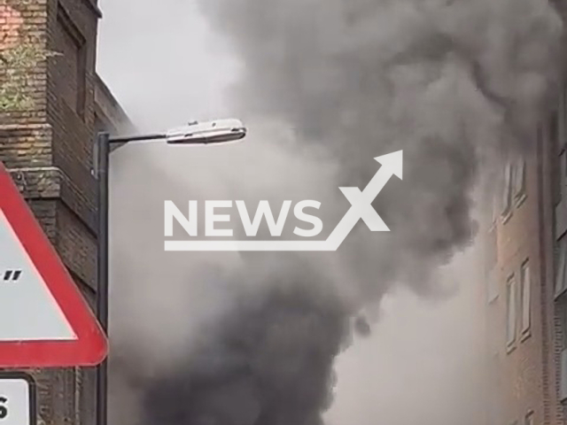 A fire in the railway arches in Southwark, London, UK, on Wednesday, Aug. 17, 2022. Around 70 firefighters are working on extinguishing it. Note: Picture is a screenshot from a video (@MissPokeno/Newsflash)