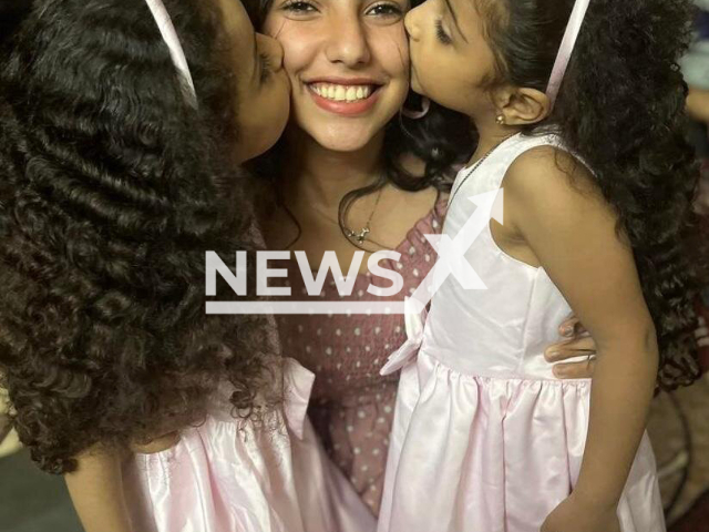 The Egyptian artist Miretya Emad poses with two of her family members who died in the Abu Sefein church fire accident in Imbaba, Giza governorate, Egypt, in an undated photo. Miretya lost six family members in the fire. Note: Private photo. (@miretya_emad.official/Newsflash)