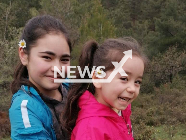 Rana Beceren, 4, (right) poses together with her older sister in an undated photo. Rana died in Canakkale, Turkey, Sunday, Aug. 14, 2022. Note: Picture is private (@gursel.gursel.5454/Newsflash)