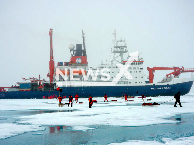 Scientists on the PS131 enter an ice floe in the ice edge zone north of Spitsbergen. The Polarstern was expected to arrive at the Lloyd Werft pier in Bremerhaven, Germany, on Wednesday, Aug. 17, 2022. Note: Licensed photo (Alfred-Wegener-Institut, Vera Schlindwein/Newsflash)