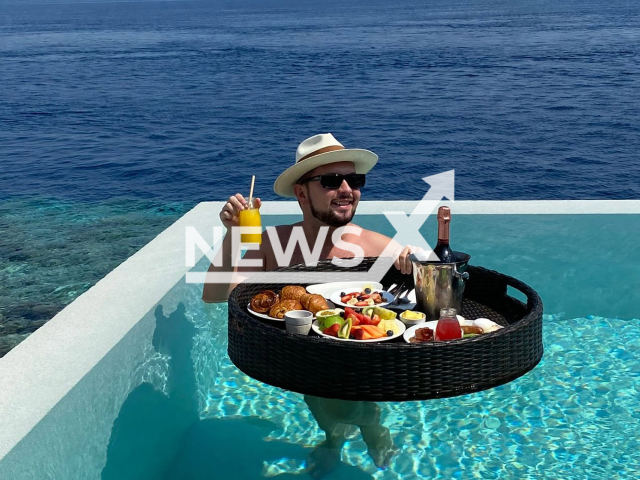 Lifestyle influencer, Cosmin Cernica, 29, poses for a picture while enjoying quality food, in an undated photo. Cosmin loves trying different cuisines and exploring when it comes to food. Note: We obtained permission for this picture (@cosmincernica/Newsflash)