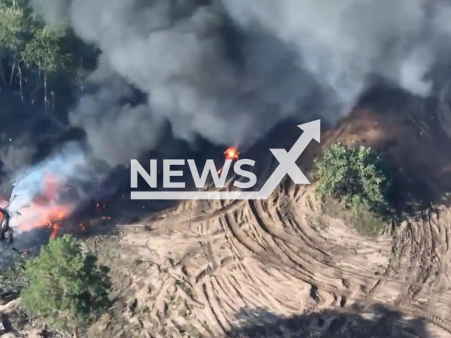 Russian military equipment burns after being destroyed by the Ukrainian Ground forces in Ukraine in undated footage. 
Ukraine military authorities report that in the attack destroyed Russian combat vehicle and five Russian soldiers.
Note: This picture is a screenshot from the video (@UkrainianLandForces/Newsflash).