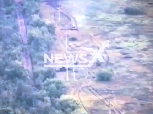 Russian tank drives along a forest strip in Ukraine in undated footage.
Ukrainian authorities reported that 1912 Russian tanks were destroyed till Sunday, Aug. 21, 2022.
Note: This picture is a screenshot from the video.
(@AFUStratCom/Newsflash)