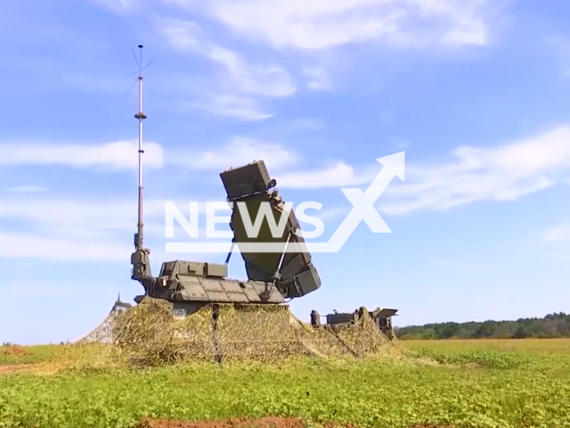 Radar of the S-300V anti-aircraft missile system of the Western Military District in camouflage net works in a field area of Ukraine in an undated footage. The S-300V air defense system is designed for air defense of military groups against attacks by cruise missiles, aeroballistic and ballistic missiles, as well as tactical and strategic aircraft. Note: This picture is a screenshot from the video (@mil/Newsflash).