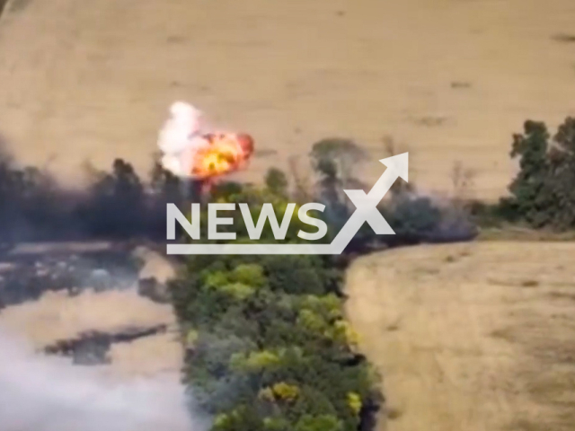 Russian tank explodes after being hit by artillery from the 14th separate mechanized brigade in the eastern front in Ukraine in undated footage.
The 14th separate mechanized brigade was formed in December 2014 from elements of the disbanded 51st Mechanized Brigade and newly mobilized units.
Note: This picture is a screenshot from the video.
(@14ombr/Newsflash)