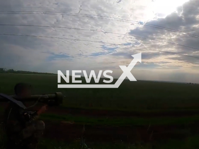 Ukrainian soldier aims a man-portable air-defense system (MANPAD) in a field area in Donetsk region, Ukraine in an undated photo. Anti-aircraft fighters of the 58th separate motorized infantry brigade named after hetman Ivan Vyhovskyi destroyed Russian enemy targets with accurate shots. Note: This picture is a screenshot from the video. (@58ompbr/Newsflash)