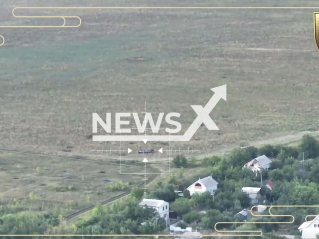 Picture shows Russian MT-LB vehicle on an open field in the Kharkiv region in Ukraine in undated footage.
The MT-LB is a Soviet multi-purpose, fully amphibious, tracked armored fighting vehicle in use since the 1950s. 
Note: This picture is a screenshot from the video (@22ompb/Newsflash).