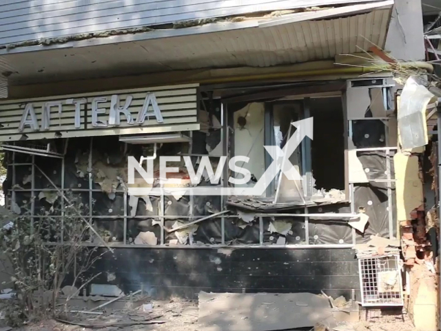 Picture shows drugstore destroyed by Russian shelling in central part of Kharkiv, Ukraine, Tuesday, Aug. 30, 2022. As a result of the shelling, four people died, 7 people received shrapnel wounds. Note: Photo is a screenshot from the video (@MNS.GOV.UA/Newsflash)