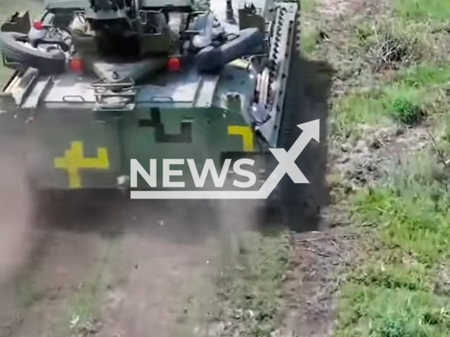 Ukrainian soldiers drive the upgraded Russian MT-LB equipped it with an anti-aircraft gun in Ukraine in undated footage.
The Armed Forces of Ukraine won the MT-LB as trophy in the battle with Russian Armed Forses.
Note: This picture is a screenshot from the video.
(@AFUkraine/Newsflash)