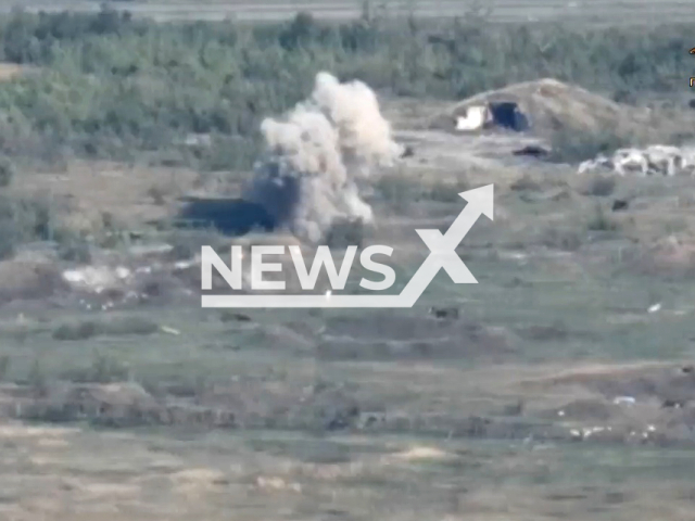 Picture shows an explosion in a field area in Avdiivka, Ukraine in undated footage. DPR battalion 1539 named after the Archangel Michael strikes at the territory of the fortified area of the Armed Forces of Ukraine in the former military unit of air defense A-1428.  Note: Picture is a screenshot from a video (@nm_dnr/Newsflash)