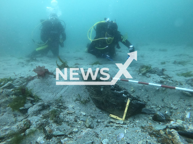 Divers explore a part of a medieval passenger boat found in the port of Ribadeo, Spain, undated. The findings represent the first material evidence of the transport used in the pilgrimage to Compostela. Note: Licensed photo.  (Xunta de Galicia/Newsflash)