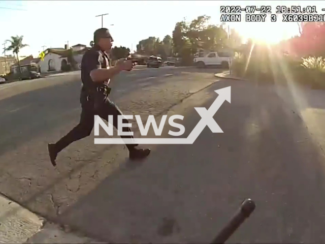 The police officer shooting in a suspect on 22nd July 2022 in Los Angeles, USA. Note: Photo is a screenshot from the video (Los Angeles Police Department/Newsflash)