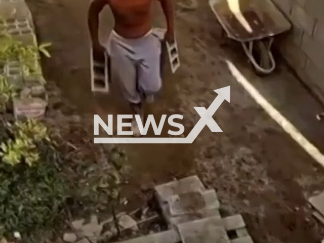 Felipe Maximo Dias de Oliveira, known as Felipe Adam, 18, from Sao Paulo in Brazil, works as a bricklayer in an undated video. He is known to try to look like a Human Ken. Note: Picture is a screenshot from a video (Newsflash)