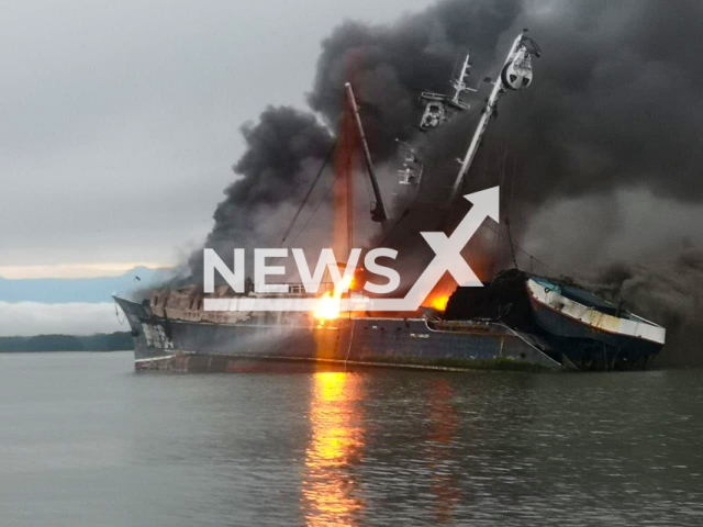 A Venezuela-flagged fishing vessel on fire, off the cost of Colombia, undated. The Columbia navy recue 29 crew members from  the boat. Note: Licensed photo.  (Armada de Colombia/Newsflash)