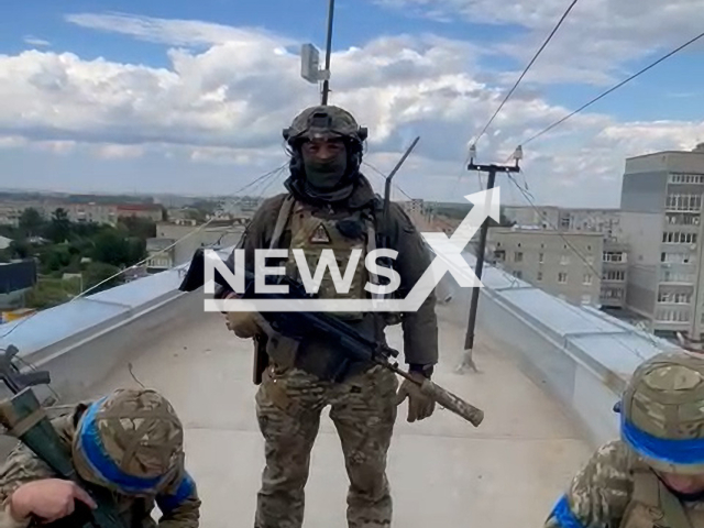 Ukrainian defenders with the Russian tricolor under their feet and a raised Ukrainian flag announce the liberation of Balakliia in eastern Ukraine on Thursday, Sep. 8, 2022.
Balakliia  is a city in Izium Raion, in Kharkiv Oblast eastern Ukraine, on the north-east side of the Siverskyi Donets river close to where it is joined by the Balakliika river which runs through the city.
Note: This picture is a screenshot from the video.
(@V_Zelenskiy_official/Newsflash)