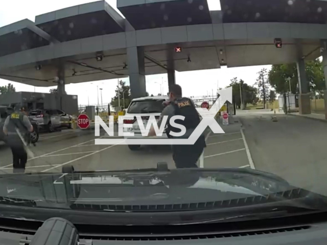 The police officer shoots the suspect in Oklahoma City in the USA on 22 August 2022. Note: Photo is a screenshot from the video (Oklahoma City Police Department/Newsflash)