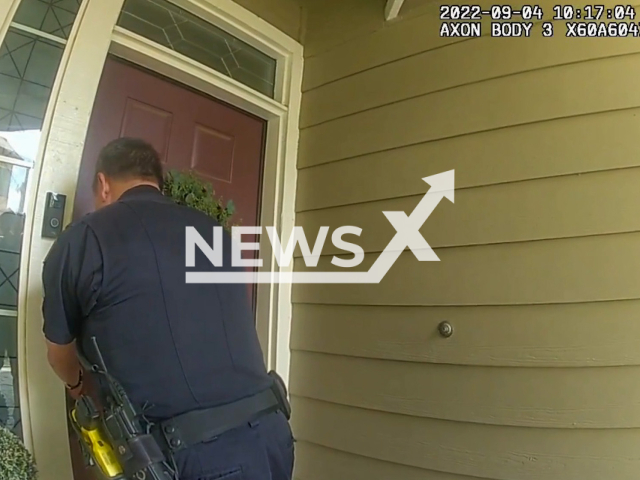 Police officers enter house in Simi Valley, California, USA, on Saturday, Sept. 3, 2022. They chased  a bear out the house and the back yard  Note: Picture is a screenshot from a video (Simi Valley Police Department/Newsflash)