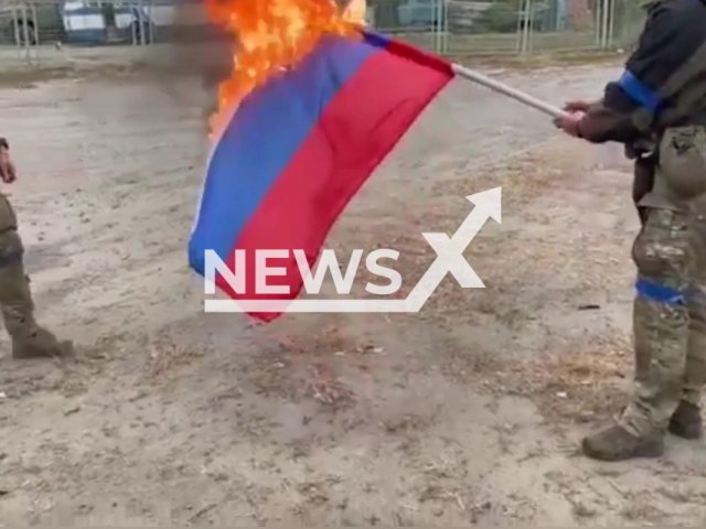 The Armed Forces of Ukraine cleans Russian symbols in Vovchansk in the Kharkiv region in an undated video. The city that is 3km to the border with Russia was liberated on 11 September 2022.Note: Photo is a screenshot from the video (State Border Service of Ukraine/Newsflash)