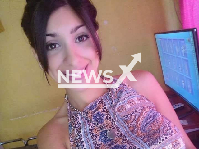 Victim, Micaela Perez, 27, poses in undated photo. She died after being allegedly stabbed by her ex-boyfriend in Isidro Casanova, Argentina. Note: Private photo. (Newsflash)