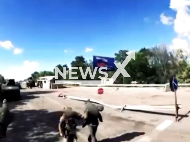 Soldiers of the SSO of Ukraine face the Russian soldiers at a checkpoint in Izium, Kharkiv Oblast, Ukraine. The Special Operations Forces are the special forces of Ukraine and one of the five branches of the Armed Forces of Ukraine, with headquarters in Kyiv. Note: Picture is a screenshot from a video (Command of the Special Operations Forces of the Armed Forces of Ukraine/Newsflash)