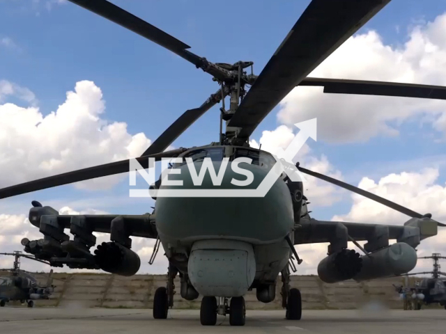 Russian Crew of Ka52 helicopters destroys barge with Ukrainian soldiers trying to cross the Dnieper river in Zaporizhzhia, Ukraine. The crew, using a search and sighting system, found a barge with APU militants at a distance of 15 km. Note: Picture is a screenshot from a video (Ministry of Defense of Russia/Newsflash)