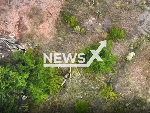 Ukrainian soldier aims a rocket launcher in a field area in Ukraine in undated photo. Soldier of the Special Operations Forces of the Armed Forces of Ukraine destroyed Russian machine gun calculation with an accurate shot from an anti-tank launcher. Note: Picture is a screenshot from a video (@8regimentUkraine/Newsflash)