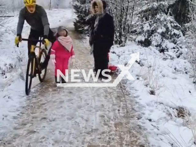 Cyclist gives a knee punch to a young girl in Belgium. Note: Picture is a screenshot from a video (Newsflash)