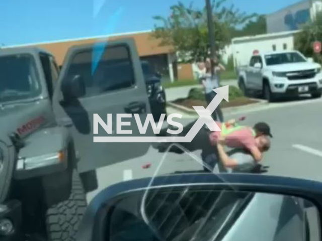 Chick-fil-A employee stops the man who allegedly tried to carjack a woman with a baby in Okaloosa, Florida, USA in an undated photo. The employee was identified as Mykel Gordon.Note: This picture is a screenshot from the video (Okaloosa County Sheriff's Office/Newsflash).