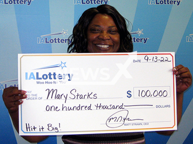 Mary Starks poses with her USD 100,000 check, in Davenport, Iowa, USA, undated. It's her second USD 100,000  jackpot from an Iowa Lottery scratch-off ticket in just over two years. 
Note: Private photo.  (Iowa Lottery/Newsflash)