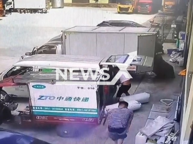 Man takes off his trousers as mobile phone in his pocket starts to smoke in Anshun, China on Monday, Aug. 22, 2022. He reportedly informed the mobile phone manufacturer about the case. Note: This picture is a screenshot from the video. (xx16718567666/AsiaWire).