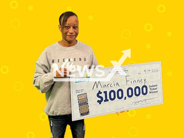 Marcia Finney, 44, poses with the check for her USD 100.000 lottery win, undated. She stopped to to buy gas and potato chips, but her usual store was closed, shw went to Mike's Food Store and  bought a Spectacular Riches scratch-off lottery ticket  in  Shelby, North Carolina, USA.
Note: Licensed photo.  (The North Carolina Education Lottery/Newsflash)