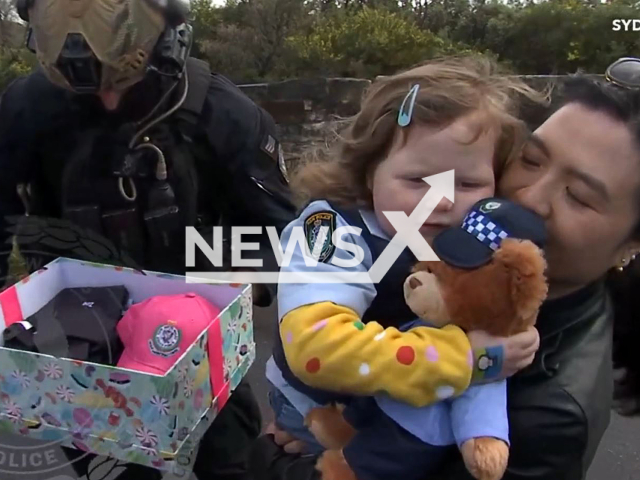 A terminally ill girl celebrates her fourth birthday by tracking down and arresting a cunning thief with the assistance of the NSW Police Force in New South Wales, Australia. Note: This picture is a screenshot from the video (TheNSWPolice/Newsflash).