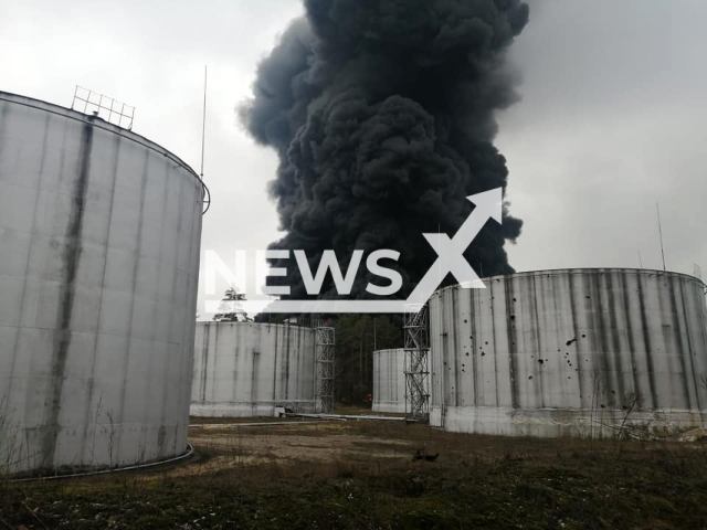 Burning oil base after being hit by a shell in Chernihiv region in Ukraine on the 3rd of March 2022. Note: Emergency Service photo. (@MNS.GOV.UA/Newsflash)