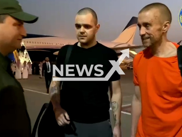 Prisoners of war in Ukraine stand in the King Khalid International Airport, Riyadh, the Kingdom of Saudi Arabia, Wednesday, Sep. 21, 2022. Five citizens of Great Britain, two citizens of the USA and one representative each of Sweden, Croatia and Morocco were released from Russian captivity. Note: Picture is a screenshot from a video (@Koord_shtab/Newsflash)