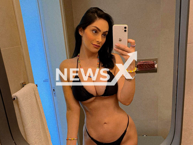 Brazilian former Big Brother participant, Francine Piaia, poses in undated photo. She reportedly said that she will distribute free nudes if the Brazilian team wins the World Cup. Note: Private photo. (@francinepiaia/Newsflash)