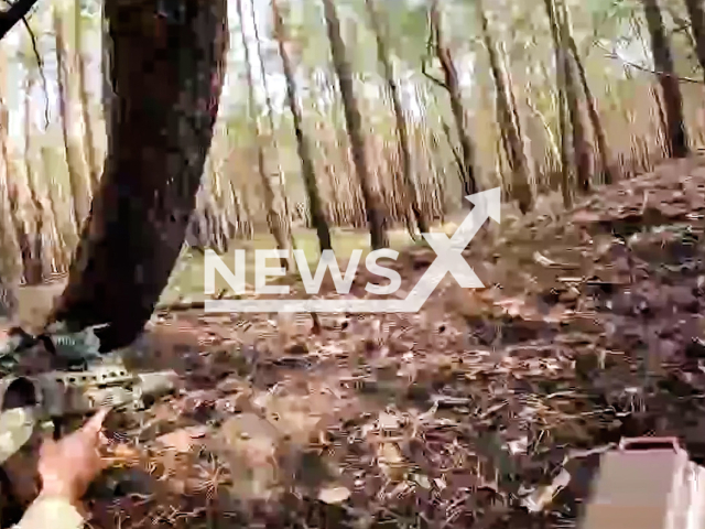 Picture shows solider with a riffle from the Special forces of the Armed Forces in a close battle with the Russian military in a forest in the Donetsk region in Ukraine in undated footage.
According to the Ukrainian military authorities in the battle the Special forces of the Armed Forces destroyed the crews of three Russian "Tigers".
Note: This picture is a screenshot from the video.
(@usofcom/Newsflash)