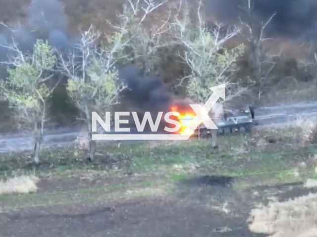 Destroyed Russian military equipment explodes in a field area of Ukraine in undated photo. Mykolaiv paratroopers destroyed 5 units of Russian military equipment: a tank, two infantry fighting vehicles, an IMR-2 barrier engineering vehicle and an MT-LB armored personnel carrier along with crews and personnel. Note: This picture is a screenshot from the video . (@www.dshv.mil.gov.ua/Newsflash)