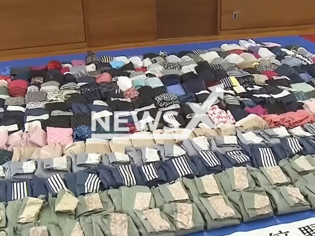 Picture shows some of the 360 raindrops police found in the suspect house, undated.
Yoshio Yoda, 51, was arrested on suspicion of theft  for repeatedly stealing women's raincoats, in Osaka City, Japan, on Thursday, Sept. 22, 2022.
Note: Photo is a screenshot from a video. (Newsflash)