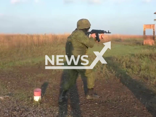 Russian soldier aims a gun on a training area on the territory of the DPR in undated photo. First mobilized Russians arrived to DPR and began intensive combat training. Note: Photo is a screenshot from the video (@nm_dnr/Newsflash)