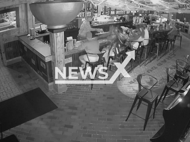 Jason Diong, the former manager of the Crab Du Jour restaurant throwing water at customers face after she complains about the food in Greenfield, Wisconsin, Tuesday, Aug. 16, 2022. About a week after the incident customer visited the restaurant to confront Diong  Note: Photo is a screenshot from a video.(Greenfield Police Department/Newsflash)