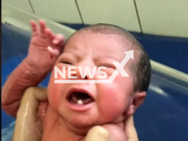 Picture shows little Ariella, Adria Paes' newborn daughter, undated. Ariella was born with two teeth. Note: Private photo. (@adriapaes/Newsflash)