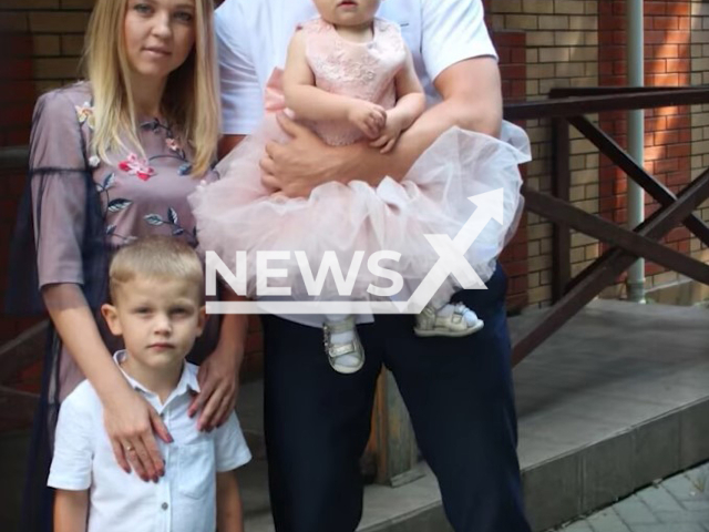 Bohdan Shcherban, 36, special officer of the Vinnytsia Rapid Operational Response Unit, poses with his wife Yuliya, his son Volodymyr and his daughter Elina in undated photo. Bohdan died in May, 2022 under Russian missile attack in the Zaporizhzhia region during his combat task. Note: Police photo. (@UA.National.Police/Newsflash)