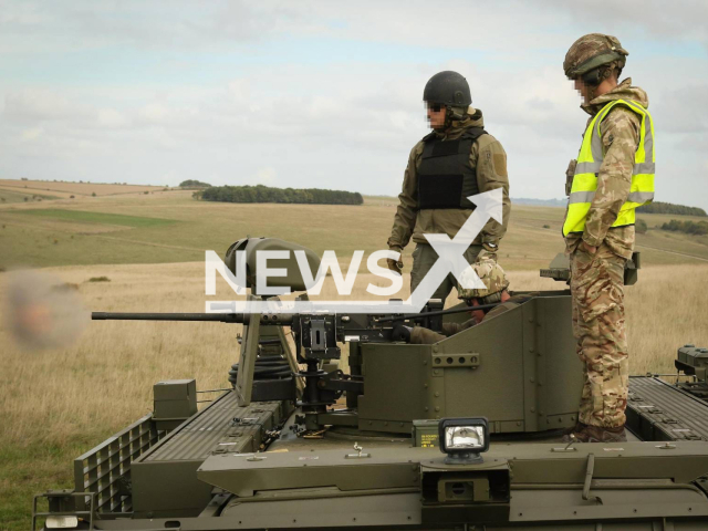 Junior commander of the Armed Forces of Ukraine shoots a machine gun during training in Great Britain in undated photo. Training is conducted by Ukrainian and British instructors with the involvement of foreign models of weapons and military equipment. Note: Picture is obtained from General Staff of the Armed Forces of Ukraine. (@GeneralStaff.ua/Newsflash)