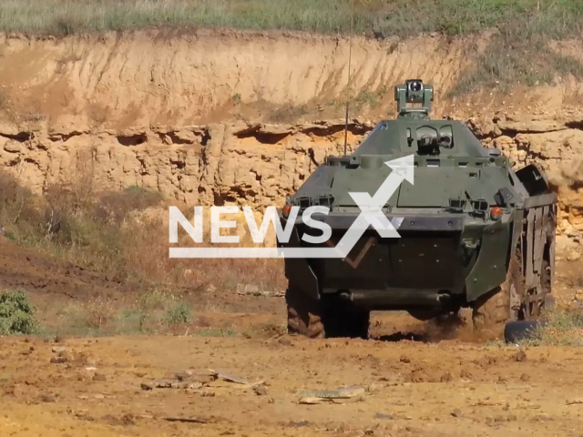 Russian BRDM-2MS combat vehicle goes in a filed area in Ukraine in undated photo. Russian Airborne Troops' modernised BRDM-2MS armoured reconnaissance vehicles were used for training Russian mobilized personnel. Note: Picture is a screenshot from a video (@mod_russia_en/Newsflash)