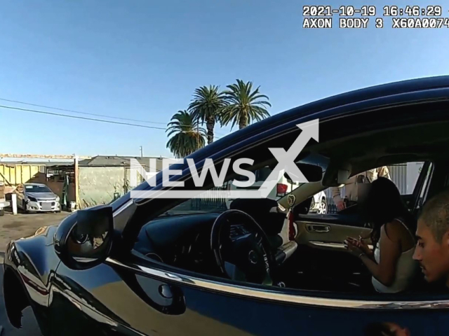 This picture shows the moment before the police officers arrest the suspect in Los Angeles, California, USA on Oct. 19, 2021.Note: Photo is a screenshot from a video.(Los Angeles County Sheriff's Department/Newsflash)